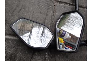 Brommer koffer en twee spiegel.