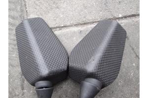 Brommer koffer en twee spiegel.