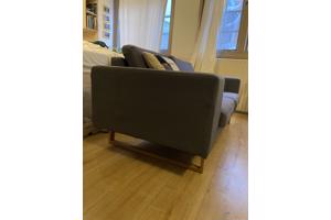 Grijze tweezits bank