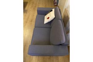 Grijze tweezits bank