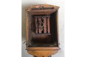 slinger klok met gewichten