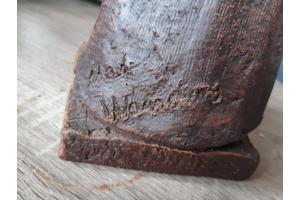 Beeldtje Karnende boeren meid