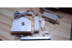 Nintendo Wii + 1 controller + 1 nunchuk