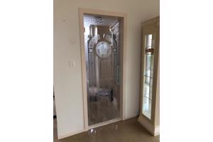 Glazen versace stijl deur