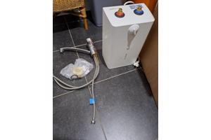 Inductiekookplaat en keukenboilertje