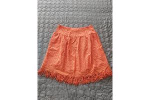 Drole de Copine rok gaatjes patroon oranje M/L 38/40