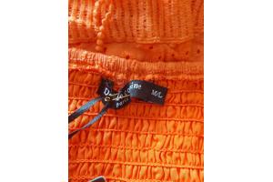 Drole de Copine rok gaatjes patroon oranje M/L 38/40