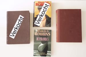 2 boeken van Harold Robbins, gaan over geld, seks en macht