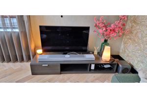 Mooi donkerbruin houten tv meubel