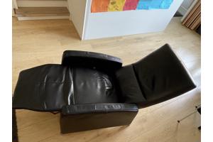 Zwart leren fauteuil uitklapbaar