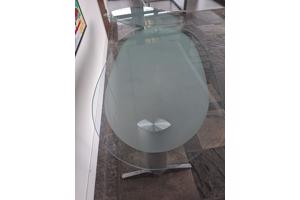 Glazen bureautje . Twee delen, draaibaar zijblad. RVS onderstel.