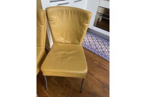 4 gele leren stoelen