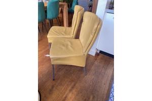 4 gele leren stoelen