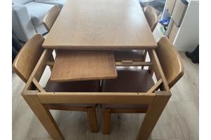 Houten vintage tafel met 4 stoelen en uitschuifstuk