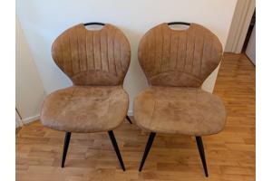 2 Cognac kleur eettafel stoelen