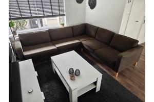 L-vormige hoekbank met hockers