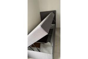 Eenpersoons bed met opbergruimte