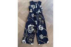 Blauwe jumpsuit met wit/gouden bloemen van Joseph Ribkoff