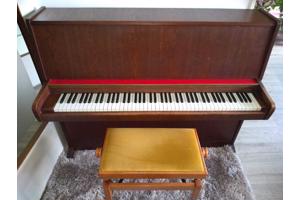 Piano met verstelbaar pianobankje