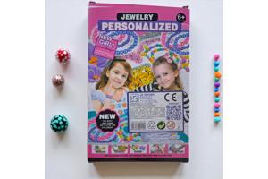 Maak je eigen armband roze doos vanaf 6 jaar