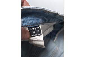 wijde jeans driekwart lang met omslagpijp lichtblauw 32 M/L