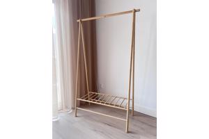 Elegant clothing rack in light bamboo