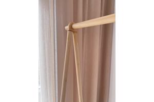 Elegant clothing rack in light bamboo