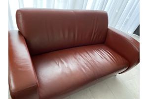 Rood lederen 2 EN 2,5 zits bank