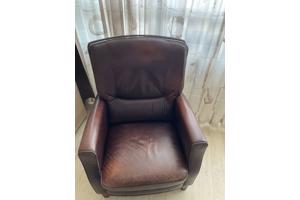 Twee rood/bruine leren fauteuils
