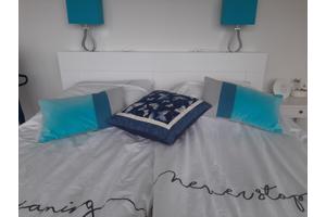 Hoofdeinde bed met opbergruimtes