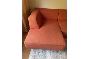 Oranje BIJENKORF bank met chaise longue