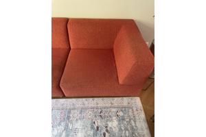 Oranje BIJENKORF bank met chaise longue