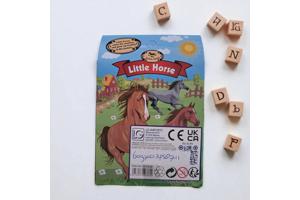 Little horse speelpaard zwart grijs gevlekt bruin haar