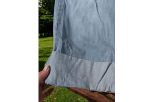 wijde jeans driekwart lang met omslagpijp lichtblauw 32 M/L