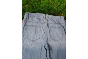 wijde jeans driekwart lang met omslagpijp lichtblauw 32 M/L