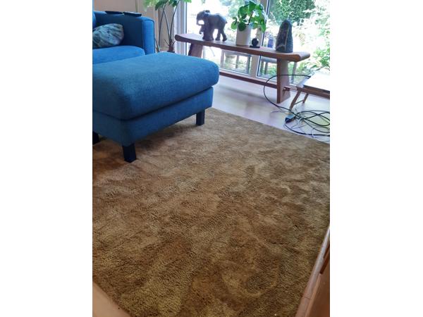 Zacht vloerkleed goudkleurig