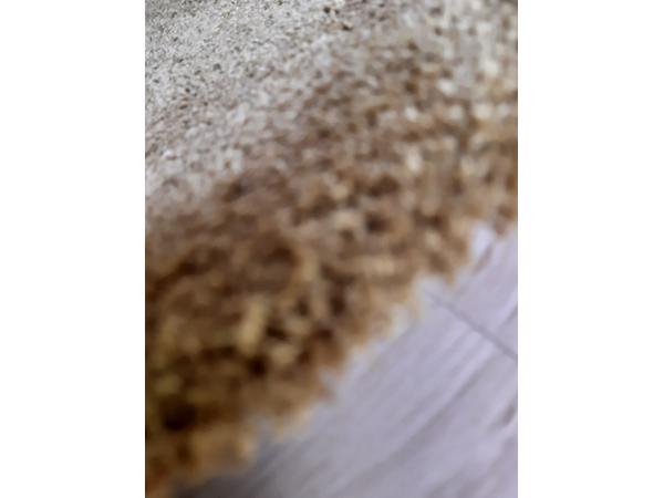 Zacht vloerkleed goudkleurig