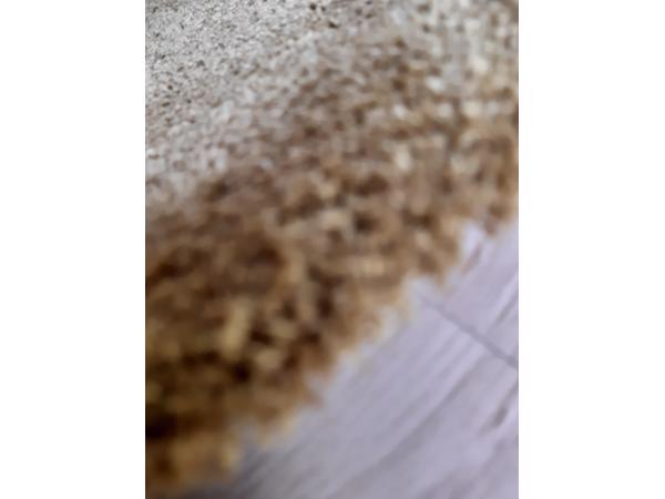 Zacht vloerkleed goudkleurig