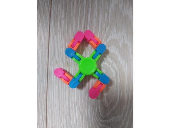 Flexibele Fidget Spinner groen meerkleurig