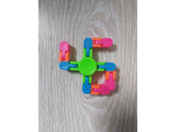 Flexibele Fidget Spinner groen meerkleurig