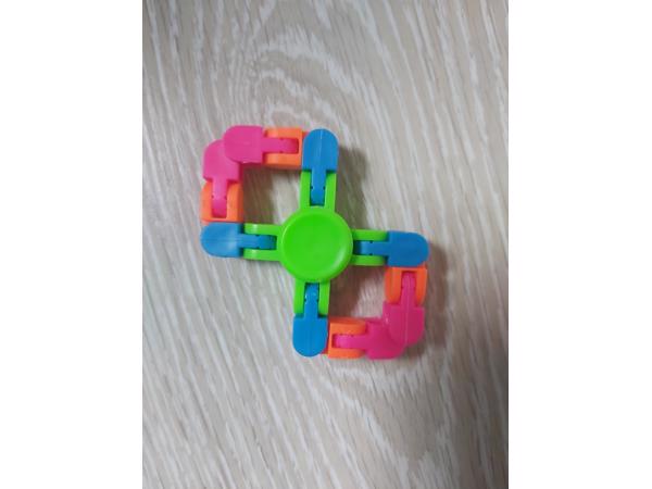 Flexibele Fidget Spinner groen meerkleurig