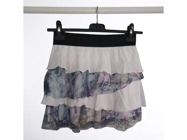 Mini rok met laagjes van kant wit S/M
