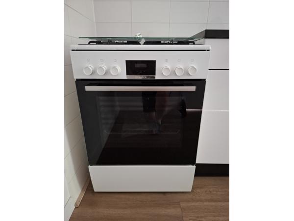 Verplaatsbaar gasfornuis met elektrische oven in goede staat