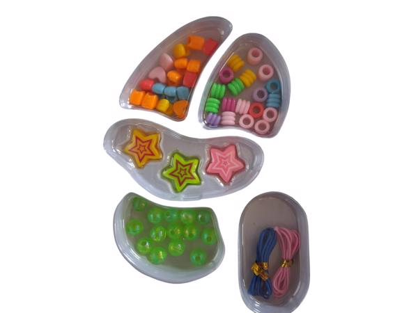Maak je eigen armband roze vanaf 6 jaar
