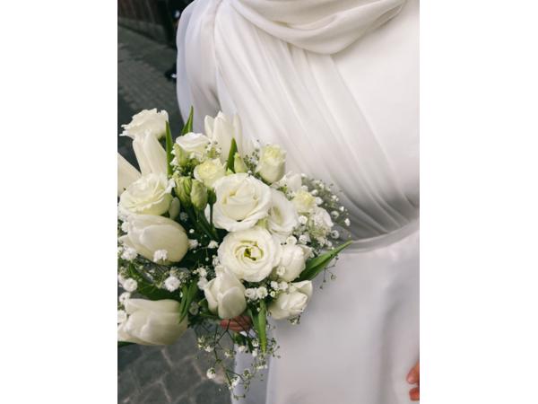 Trouwjurk modern op maat genaaid