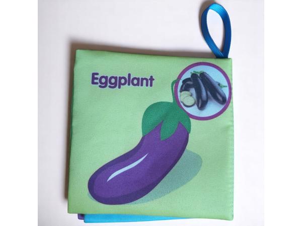Educatief stoffen knisper babyboekje vegetable
