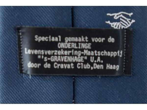 Stropdas van Onderlinge ‘s-Gravenhage donkerblauw.