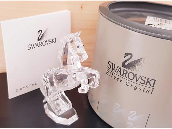 Swarovski hengst doos en certificaat oortjes gerepareerd