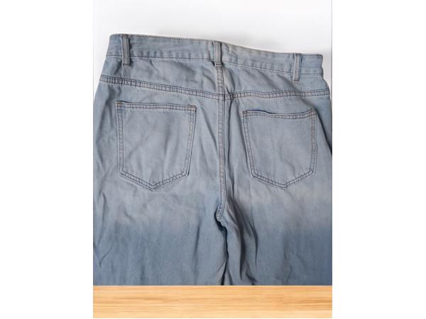 wijde jeans driekwart lang met omslagpijp lichtblauw 32 M/L