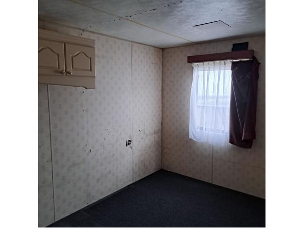 Te koop stacaravan 11 x 3,70 meter